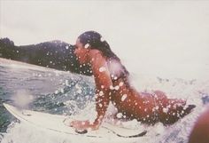 a person on a surfboard in the water