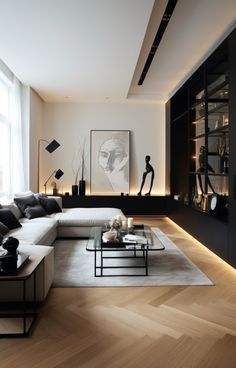 a modern living room with black and white furniture