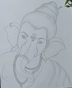 an elephant drawn in pencil on paper next to a potted plant