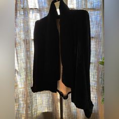 Vintage Lavish Quality Black Velvet Short Jacket With Scarf Attached. Belled, Cuffed Sleeves, Flared Cut. Bright And Soft Quality Cotton. Hard To Capture The Beauty Of This Jacket. Chic Fitted Cape Outerwear, Chic Evening Cape Outerwear, Fitted Cape Outerwear For Work, Fitted Cape For Workwear, Elegant Black Cape Outerwear, Black Shawl Collar Evening Blazer, Black Shawl Collar Outerwear For Formal Occasions, Formal Black Shawl Collar Outerwear, Black Shawl Collar Blazer For Evening