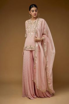 Rose pink short kurta with floral, cutdana, zari hand embroidery. Paired with mukaish embroidered sharara and scallop trimmed dupatta with floral embroidery. - Aza Fashions Pink Palazzo Set With Dori Work, Pink Dori Work Kurta For Reception, Pink Kurta With Dori Work For Reception, Pink Gota Work Salwar Kameez For Reception, Pink Salwar Kameez With Gota Work For Reception, Pink Sharara With Dori Work, Traditional Pink Palazzo Set For Reception, Pink Palazzo Set With Dori Work For Wedding, Fitted Pink Palazzo Set With Gota Work