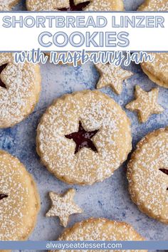 shortbread linzer cookies with raspberry jam are on a blue plate and the words, shortbread linzer cookies with raspberry jam