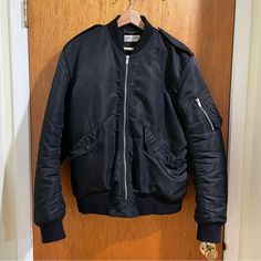 Very Gently Owned Barely Worn Condition. Msrp 2590 Usd. Ysl Size 52/Xl. Saint Laurent Bomber Jacket Made With Recycled Polyamide With Epaulets, Snap-Button Front Flap Pockets And Zip Cargo Pocket On Sleeve. - Recycled Polyamide - Silk Lining - Zip Front Closure - Two Snap-Button Flap Pockets At The Front - One Inner Pocket - Ribbed Collar - Ribbed Cuffs - Ribbed Waistband - 100% Polyamide - Style Id 699323y845w1000 - Made In Italy Cargo Pocket, Flap Pocket, Snap Button, Mens Jackets, Saint Laurent, Bomber Jacket, In Italy, Jackets & Coats, Italy