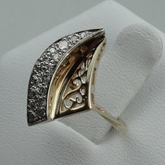 "Stunning 14K yellow gold ultra-classic art nouveau diamond ring with graceful curves and intricate metal designs. This is an eye catcher and a definite powerful option for a right-hand ring. FREE SHIPPING! Details: Solid 14K Yellow Gold (shown in picture) Diamond: (16) 1.2 mm round Approximate Diamond Weight: 0.16 ct. Diamond Clarity: SI1 Diamond Color: G Ring Size: 4 7/8 Total Weight: 2.6 grams FREE Domestic Shipping by USPS Priority Mail Signature Confirmation and includes insurance. If the i Formal Art Nouveau Diamond Jewelry, Evening Rings With Diamond Accents In 14k Gold, Evening 14k Gold Rings With Diamond Accents, 14k Gold Diamond Ring For Evening, Elegant 14k Gold Diamond Ring For Evening, Evening Yellow Gold Diamond Ring With Accents, Yellow Gold Brilliant Cut Diamond Ring For Evening, Art Deco Gold Diamond Ring With Diamond Accents, Art Deco Gold Diamond Ring With Accents