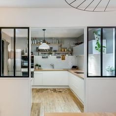 the kitchen is clean and ready to be used as a dining room or living area