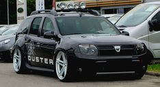 a police car is parked in front of other cars