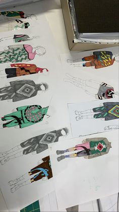 paper cut outs with different designs on them