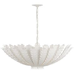 a white chandelier hanging from a ceiling fixture with frosted glass leaves on it