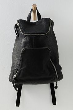 Take heavy carrying to the next level with this edgy, minimalist leather backpack. **Features:** Backpack style, bucket design, leather fabrication, exterior zipper pocket, zipper closure, interior zipper pocket, adjustable shoulder straps, top handle **Why We | Seraphina Leather Backpack Bag by FP Collection at Free People in Black Outfits With Purses, Edgy Minimalist, Jay Chou, Bucket Design, Chic Backpack, Statement Handbag, Backpack Outfit, Backpack Free, Fringe Purse