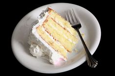 a piece of cake on a plate with a fork