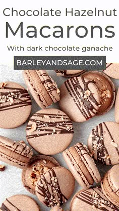 chocolate hazelnut macarons with dark chocolate ganache are on a white surface