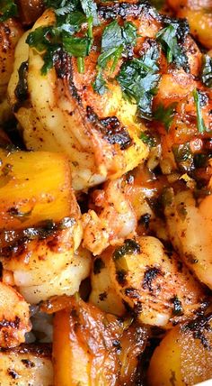 chicken and potatoes with herbs in a white bowl