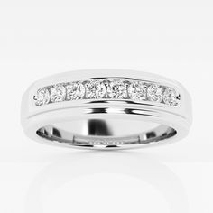 a white gold wedding ring with channeled diamonds