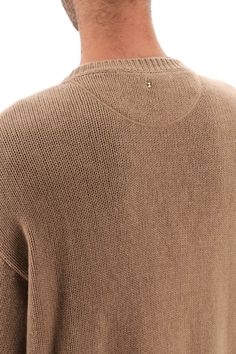 Elevate your wardrobe with this luxurious Valentino Garavani cashmere sweater adorned with the iconic stud detail on the upper-back. Crafted in pure cashmere cable knit, this sweater features a ribbed crew-neck, cuffs, and hem for a timeless and sophisticated look. The oversized fit with low-set sleeves and side slits adds a modern twist to this classic piece, making it a must-have for fashion enthusiasts who appreciate high-quality, designer fashion. Indulge in the exquisite craftsmanship and a Studded Sweater, Unique Studs, Latest Fashion Design, Emilio Pucci, Denim Pant, Cashmere Sweater, Cashmere Sweaters, Neck Designs, Valentino Garavani