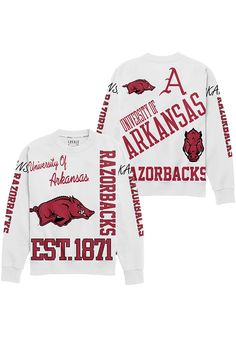 a white sweatshirt with the university of arkansas on it