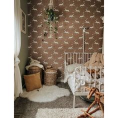 a bedroom with a white bed and brown wallpaper