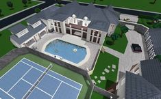 an aerial view of a house with a pool and tennis court