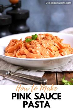 how to make pink sauce pasta in a white bowl on top of a wooden table