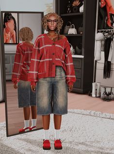 a woman standing in front of a mirror with red shoes on her feet and wearing a plaid shirt