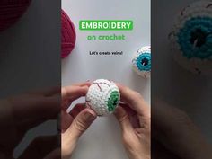 there is an advertisement for crochet yarns on the table with balls of yarn