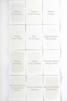 six different shades of white paint are arranged in rows on the wall, each with their own name