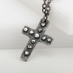 Unlock a timeless expression of faith and love with this antique medieval cross pendant necklace. Handcrafted with fine 925 sterling silver and a dark patina for contrast and great detail, it makes a great gift for men and boys alike. Show them your love and appreciation with a gift of enduring quality! Sterling Silver Oxidized Crucifix Necklace, Oxidized Cross Pendant Necklace, Medieval Cross Necklace As Gift, Medieval Cross Necklaces As Gifts, Medieval Cross Necklace For Gift, Gunmetal Cross Necklace Gift, Spiritual Cross Necklace With Oxidized Finish, Antique Silver Oxidized Cross Necklace, Antique Silver Cross Necklace With Oxidized Finish