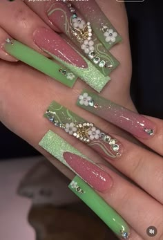 Green Nails Acrylic Birthday, Green Nails Sweet 16, Jade Square Nails, Fairy Garden Acrylic Nails, Long Light Green Nails, Glam Set Nails, Green Acrylic Nails With Charms, Princess Tiana Themed Nails, Fairy Nails Acrylic Long