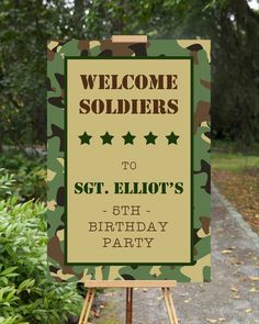 a welcome sign for soldiers to sit in front of some bushes and trees with the words, welcome soldiers to sgt elliot's 5th birthday party