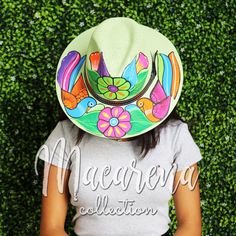 This women's hat is hand embroidered in Mexico. Handmade Cap For Rodeo, Handmade Cap For Country Events, Green Curved Brim Straw Hat For Festivals, Green Fedora For Festival, Handmade Multicolor Country Hat, Handmade Multicolor Country Style Hats, Multicolor Handmade Country Hats, Whimsical Fedora Hat, Whimsical Hat For Kentucky Derby