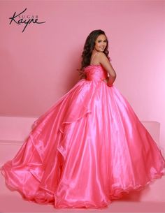 This Sugar Kayne C330 Girls Preteens Pageant Dress is the perfect choice for your special occasion. Its unique feather neckline and long organza skirt with a ruffle train will make your child stand out in the crowd. Available in Barbie Pink in size 6. Size: 6, 10, 14 Color: Barbie Pink Johnathan Kayne, Orchid White, Ostrich Feather Trim, Mnm Couture, Jasz Couture, Plastic Dress, Cinderella Divine, Skirt Ruffle, Organza Skirt