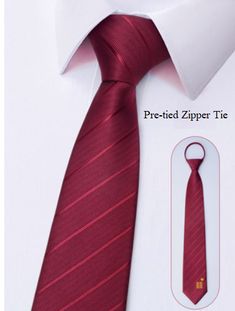 a red tie with a white shirt underneath it and a tag on the neckline