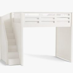 a white loft bed with stairs leading up to it