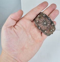 "A spectacular cuff. This Chinese Export cuff is crafted from 900/1000 silver and features an intricate spun wire filigree design. The cuff is in very good condition and is not missing any of the filigree, there it does have a noticeable ding. It is clearly hallmarked \"CHINA SILVER\", weighs 46.1 grams, and test positive for a minimum of 900 silver. The cuff measures approximately 6 inches end to end with a 1 1/2 inch opening and is 1 5/8 inches at the widest point. A fantastic example of Chine Wire Filigree, Wire Cuff, Lapis Ring, Chinese Export, Cuff Bangle Bracelet, Filigree Design, Bracelet Vintage, Cz Ring, Silver Filigree