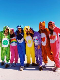 group of people in costumes posing for the camera