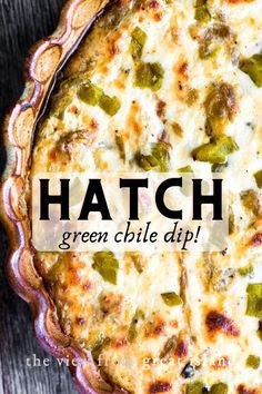 a close up of a pie on a table with the words hatch green chile dip