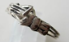 Vintage Fede Gemmel Ring - Sterling Silver Mexico - Size M in good used condition. The most romantic of wedding rings, 3 rings combined so that the hands open to reveal a secret heart. The name Fede representing hands clasped in trust and Gimmel, 2 or 3 interlocking bands representing an unbreakable union. Approximate Dimensions - hands measure 17mm x 6mm,  Ring Size - UK: M / US: 6 & ½ - not suitable for resizing Weight - 2.88 grams Era - C1980s Hallmarks - marked 925 mexico, other marks possib Hands Open, Most Romantic, Sterling Ring, Halloween Shopping, Band Rings, Vintage Antiques, Sterling Silver Rings, Jewelry Rings, Ring Size