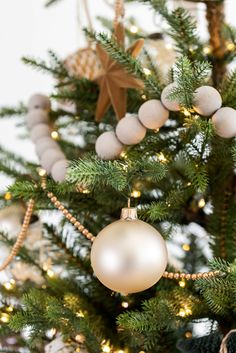 a christmas tree with ornaments hanging from it