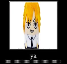 a stuffed doll with yellow hair wearing a black tie and white shirt, says ya