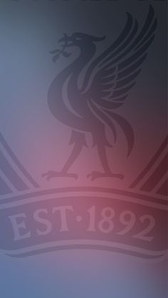 an image of the liverpool logo on a blurry background in red and blue colors