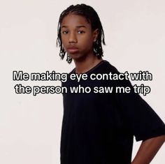 a girl with dreadlocks standing in front of a white background and the words me making eye contact with the person who saw me trip