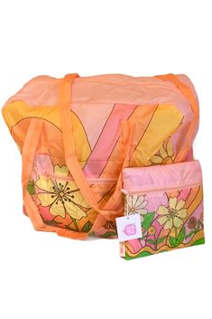 an orange and pink bag with flowers on it next to a small purse that has a tag