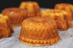 small pastries sitting on top of a wooden table