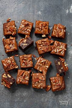 chocolate brownies with pecans and caramel drizzled on the top