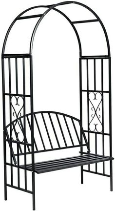 a metal bed frame with an arched top