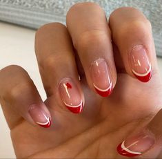 Celebrate the holiday season in style with these cute Christmas nails and designs, including festive nail art ideas that you can DIY at home! Two Tone Red French Tip Nails, French Manicure With Red Line, Coffin Shape Nails Christmas, Red French Tip Nails With White Line, White And Red French Nails, Red French Tip With White Line, White French Tip With Red Line, Cute Basic Christmas Nails, Super Simple Christmas Nails