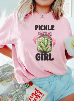 Pickle Girl Comfort Colors Shirt, Funny Quirkie Pickle Shirt, Gift For Gherkin Lover, Cute Aesthetic Valentine Pickle Gift Idea PLEASE SIZE UP FOR AN OVERSIZED FIT If you are looking for an oversized "T-shirt Dress" look, we recommend sizing up 2 sizes. Comfort Colors introduces its garment-dyed t-shirt; a fully customizable tee made 100% with ring-spun cotton.  The soft-washed, garment-dyed fabric brings extra coziness to your wardrobe while the relaxed fit makes it an excellent daily choice. T Pickle Shirt, Oversized T Shirt Dress, Shirt Oversize, Comfort Colors Shirt, Cute Aesthetic, Simple Shirts, Dyed Fabric, Dye T Shirt