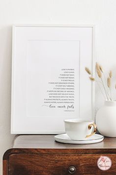 a coffee cup sitting on top of a wooden dresser