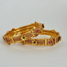 Set of 2 Ruby Green Gold Plated Bangles/Gold Bangles/Indian Bangles/Kemp stone bangles/Indian wedding/bridal jewelry/south Indian bangles Antique Delicate Bangles With Gold Plating Gold Plated Bangles Antique Bangle Ships from California in 1 business day Delivery in 2-5 business days in the USA This is 100% Handmade jewelry. So Color, shades, texture displayed may slightly vary from the actual product due to digital image limitations. We request you to consider these minor variations. Please expect the possibility of some slight imperfections when buying handmade jewelry. If you have any questions, please message or email us. Arrives in a gift box. Please let me know if you have any questions. Thank you so much for visiting my shop. Temple Jewelry Style Jeweled Bangle For Wedding, Temple Style Jeweled Bangle For Weddings, Gold Kundan Bangle For Marriage, Heavy Temple Jewelry Bracelets For Marriage, Temple Jewelry Style Bangle For Marriage, Bollywood Jeweled Wedding Bangle, Bollywood Style Jeweled Wedding Bangle, Festival Bangle For Marriage With Stone Work, Festive Marriage Bangle With Stone Work