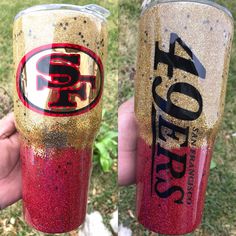 two red and gold glitter tumblers with the san francisco giants on them