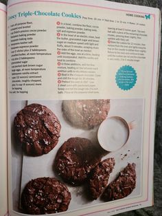 the recipe book is open to show chocolate cookies and milk on it's side